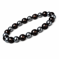 Beaded stretch bracelet with dark round hematite-tone and smoky beads