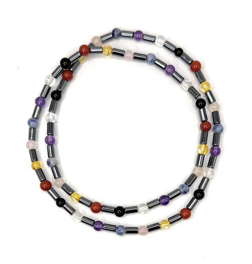 7 chakra beaded stretch necklace, multi-color beads with black and silver-tone tube beads