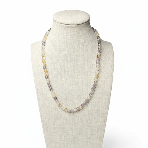 Multicolor beaded stretch necklace on mannequin, lilac, clear and amber round beads