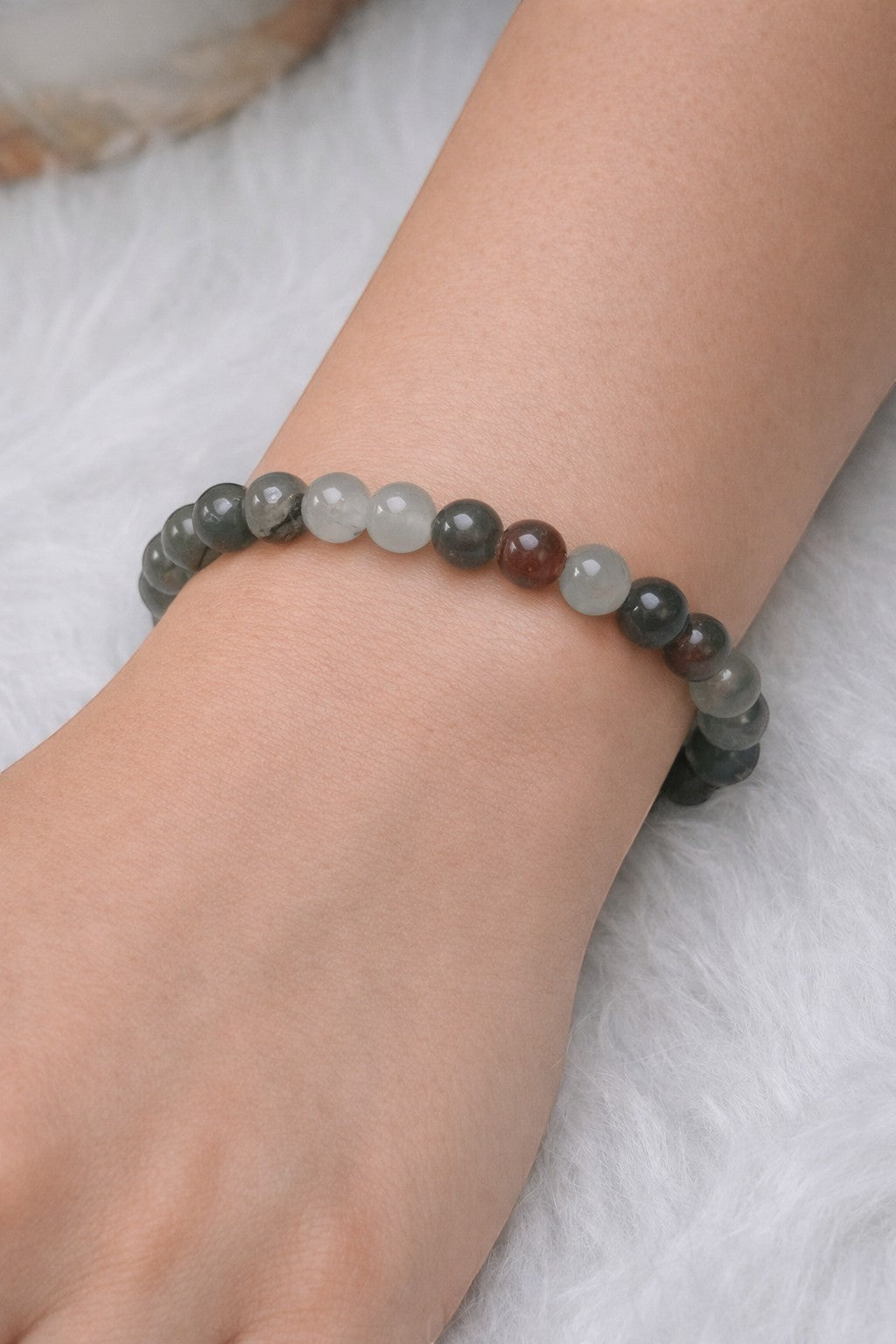 Shop of Small Creations, LLC African Bloodstone beaded stretch bracelet, 6mm natural gemstone beads in shades of green and red, on a wrist.